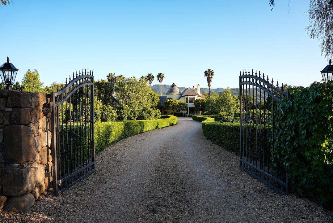 Gated entrance to private road access leading to Villa Valencia property in Ojai California