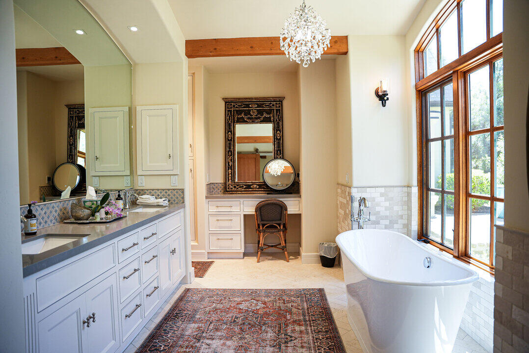 Bedroom bath, sink, and chandelier